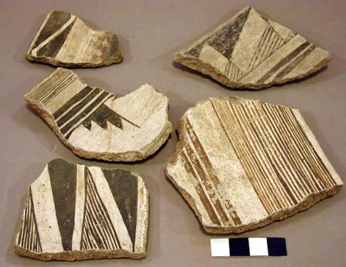 Ceramic rim and body sherds, black on white geometric designs, flaring rim