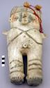 Ceramic, male figurine with colored wool tufts attached to top of head