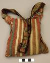 Organic, woven bag, colorful geometric designs, filled with coca leaves