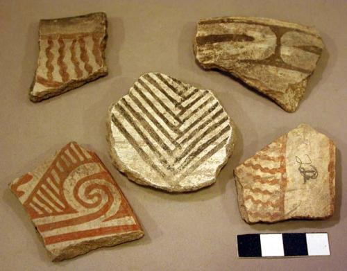 Ceramic rim and body sherds, black on white, red on white, geometric designs