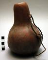 Gourd bottle and medicine (sprinkled over patients by means of a brush)