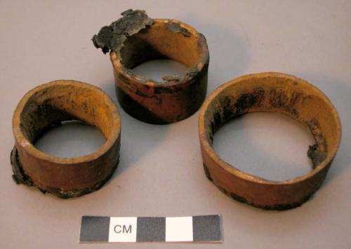 Rings, wood, edges coated in black resin