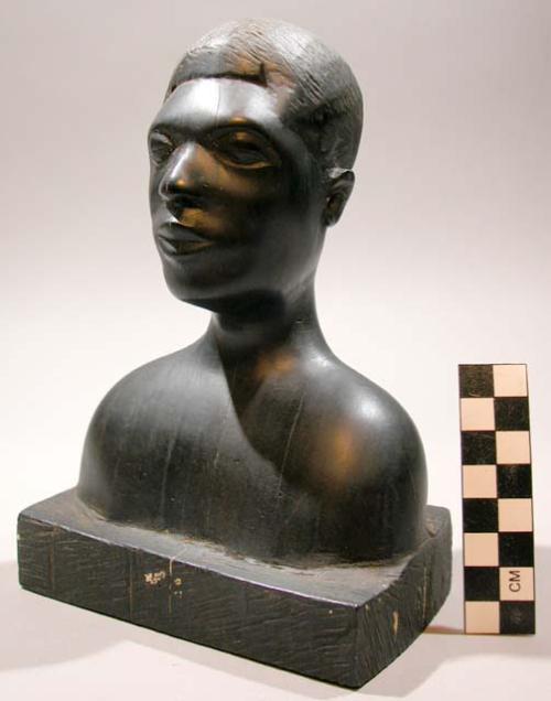 Carved wooden head (male)