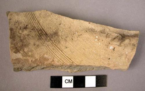 Pottery bowl section - incised and combing