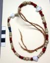 Beads strung on native string; used by shamans.
