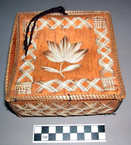 Birch bark box with porcupine quill decoration.