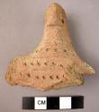 Fragment (head) of baked clay bird figurine - punctate decoration