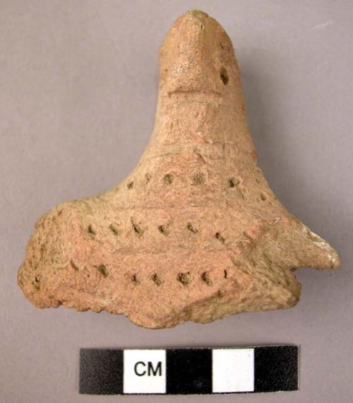 Fragment (head) of baked clay bird figurine - punctate decoration