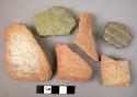 9 potsherds with grooving or incised decoration