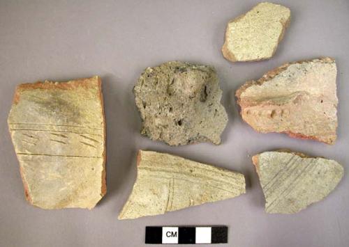 12 potsherds with incised or impressed decoration