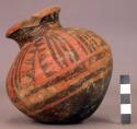 Medium sized pottery jar with constricted neck - negative painted