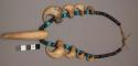 Santee Dakota necklace. Strung mountain lion claws of varying size, faceted blac
