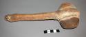 Sioux pemmican masher. Fixed stone head. Wood handle covered w/ rawhide. Three q