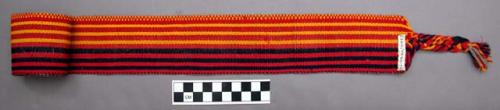 Belt - one half red and yellow, the other half blue and red cotton warp striped.