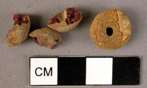 Two disk-shaped amber beads