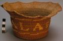 Twined spruce root basket with fluted top