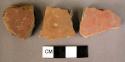 15 miscellaneous potsherds of red painted ware