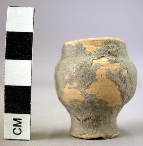 Small earthen vase