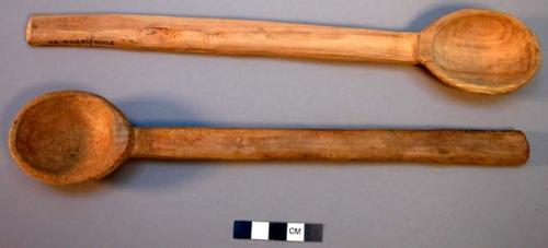 Small deep wooden spoons (kumentuwe) - used by women for tasting food +
