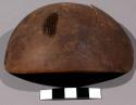 Piece of gourd (brown) - used for smoothing off earthen kettles before firing