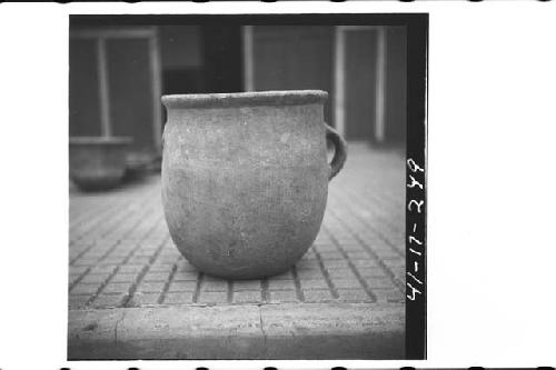 Large orange ware, 2-handled jar with Usulutan decoration.