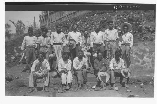 Workmen standing in front of Mound I