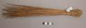 Old man's broom - pieces of fiber tied together, resembles modern whisk broom