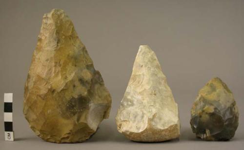 2 flint hand axes; 1 flint bifacial point