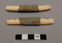 Arapaho hand game lot (2 of 2). Smooth bone, centred wrapped with leather