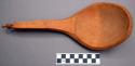 Bass-wood ladle. Crane carved at the top of the handle