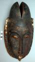"Very fine old ceremonial mask with swept back horns(?) and hollow circular mout