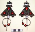 Pair of silver dress ornaments