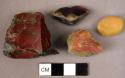12 fragments of red jaspar and ornamental rocks