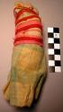 Child's doll - clay wrapped with cloth and pink and red string, pregnant female