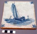 Tile of white clay with white lead glaze, blue design. Stylized floral corner de
