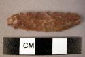 Quartzite elongated bifacially worked point on blade fragment