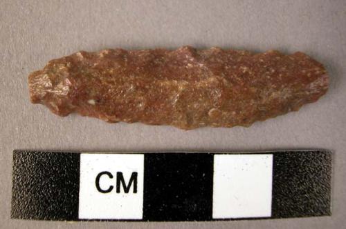 Quartzite elongated bifacially worked point on blade fragment