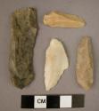 4 flint - slightly retouched and of utilized blades: one large and three small-s