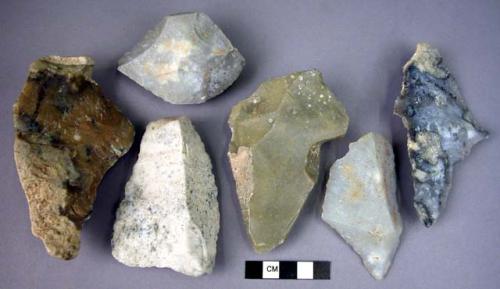 56 medium-sized utilized stone flakes