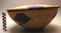 Large basket with knobbed flat lid, coiled weave, pattern in purple (mbombo)