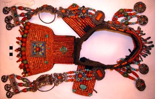 One of 2 headdresses with side ornaments attached