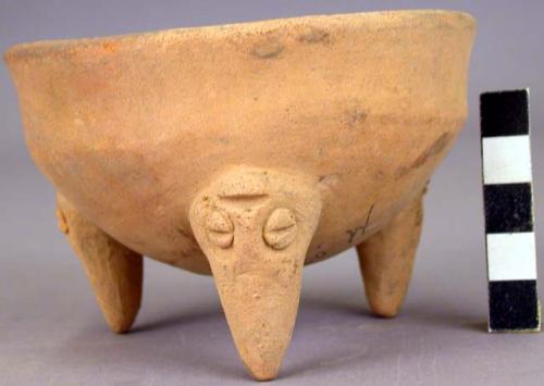 Pottery dish, tripod, plain, legs solid, human face