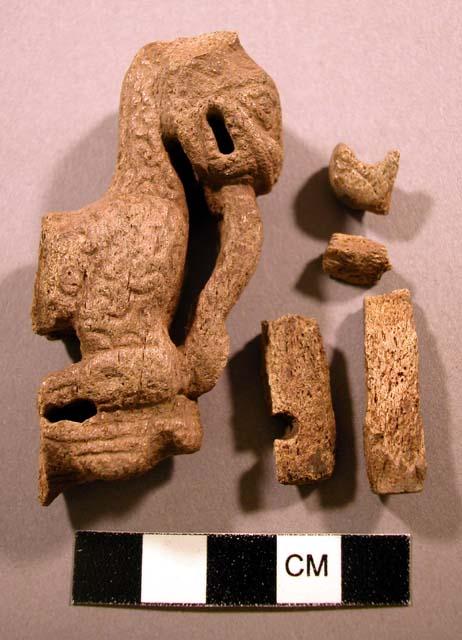 Carved bone, animal figure (jaguar?)