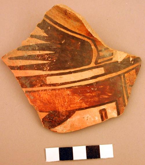 Redware pottery sherd, painted geometric design