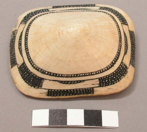 Ivory ornament, incised decoration