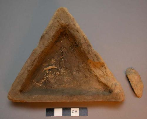 Triangular dish, grey mud