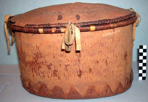 Birchbark vessel, possibly for cooking? Lid ties to vessel with hide (?) strips.