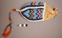 Skin pouch with bead decoration on lower half