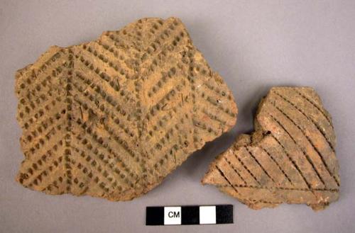 2 potsherds-comb-marked. "Late Volosovo" (a western branch of one east Russian-M