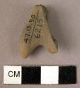 Fragment of clay figurine